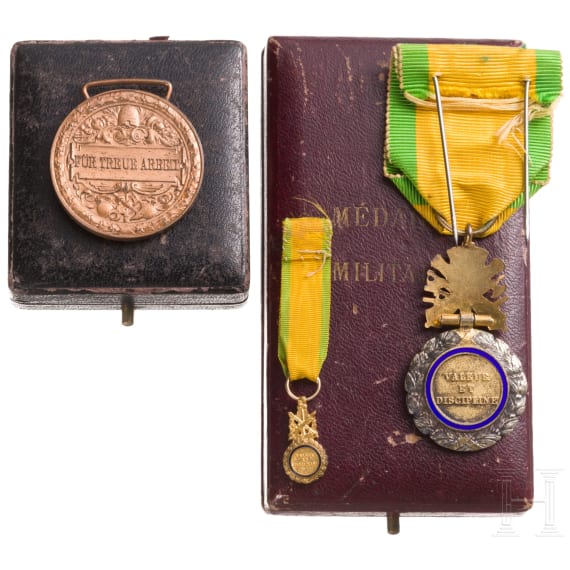 A cased French and Baden medal