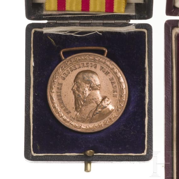 A cased French and Baden medal