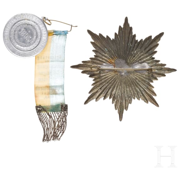 Three badges and a small collection of seals, 19th century