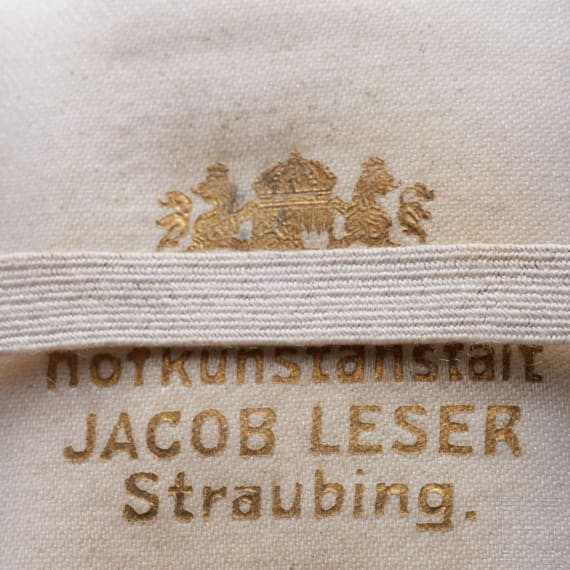 A cased Bavarian Military Order of Merit 4th class with crown and swords