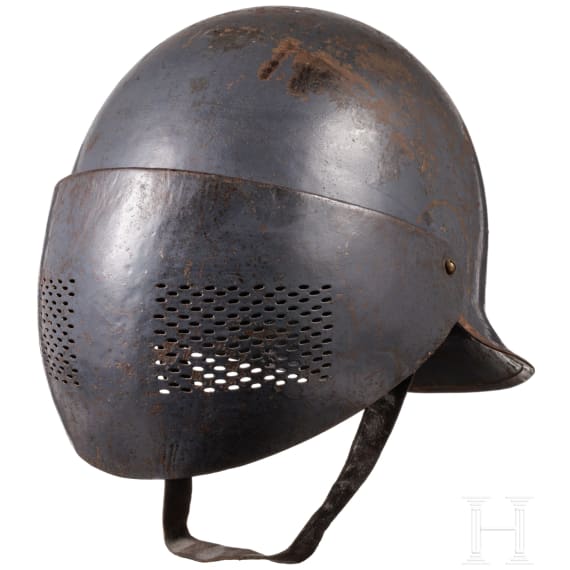 A Belgian steel helmet with protective visor for tank crews, so called "Reina Elisabeth"