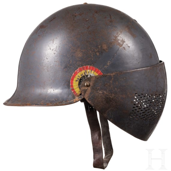 A Belgian steel helmet with protective visor for tank crews, so called "Reina Elisabeth"