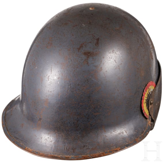 A Belgian steel helmet with protective visor for tank crews, so called "Reina Elisabeth"