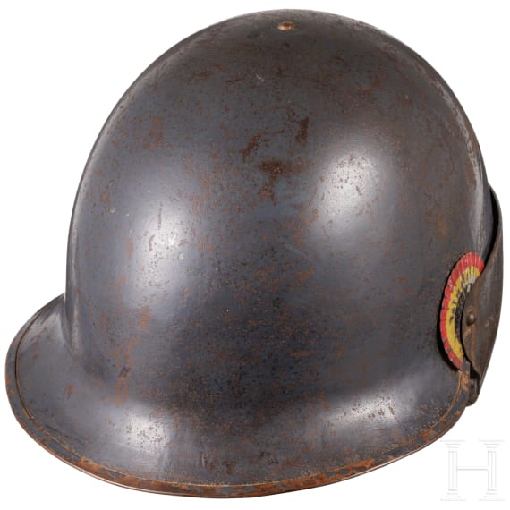 A Belgian steel helmet with protective visor for tank crews, so called "Reina Elisabeth"