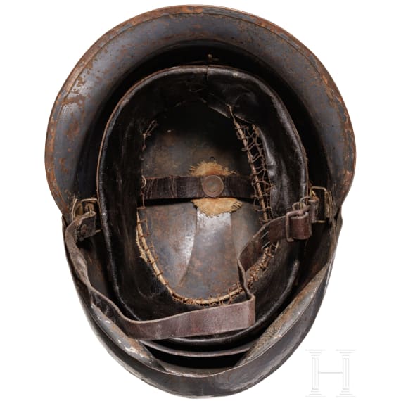 A Belgian steel helmet with protective visor for tank crews, so called "Reina Elisabeth"