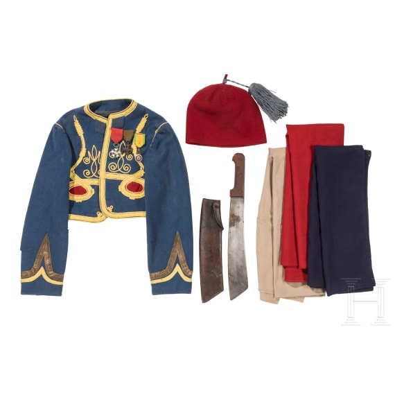 Tirailleurs s&eacute;n&eacute;galais - a fez, parade bolero with orders, cloth belt and machete, 20th century