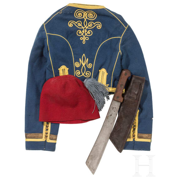 Tirailleurs s&eacute;n&eacute;galais - a fez, parade bolero with orders, cloth belt and machete, 20th century