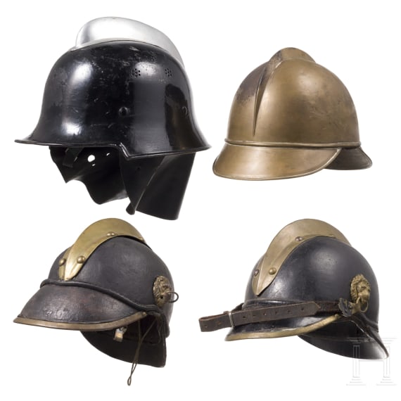 Four fire fighter helmets