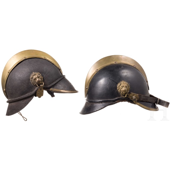 Four fire fighter helmets