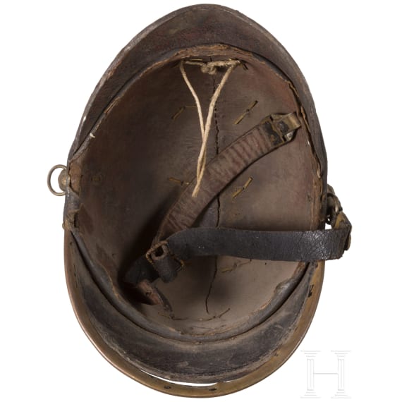 Four fire fighter helmets