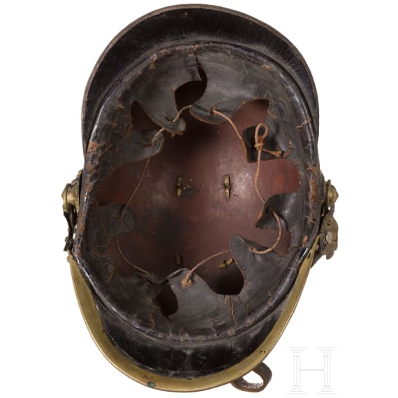Four fire fighter helmets