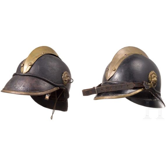 Four fire fighter helmets