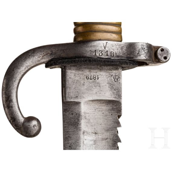 A bayonet with saw back, dated 1879