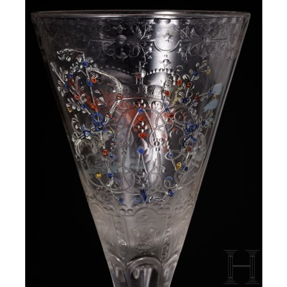 A cut and enamelled, painted drinking glass bearing the monogram of Maximilian II Emanuel, Elector of Bavaria, circa 1700-20