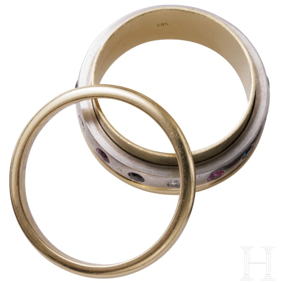 A 14ct white gold band ring set with diamonds, rubies and sapphires
