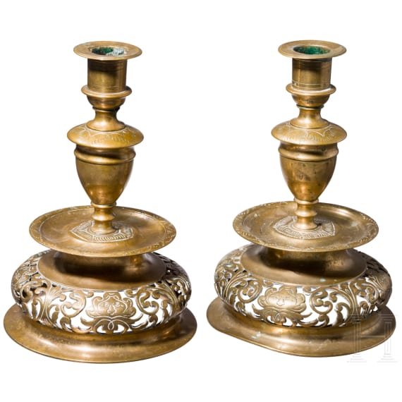 A pair of German pierced bell-bottom candlesticks in the Nuremberg style of the 17th century, circa 1880