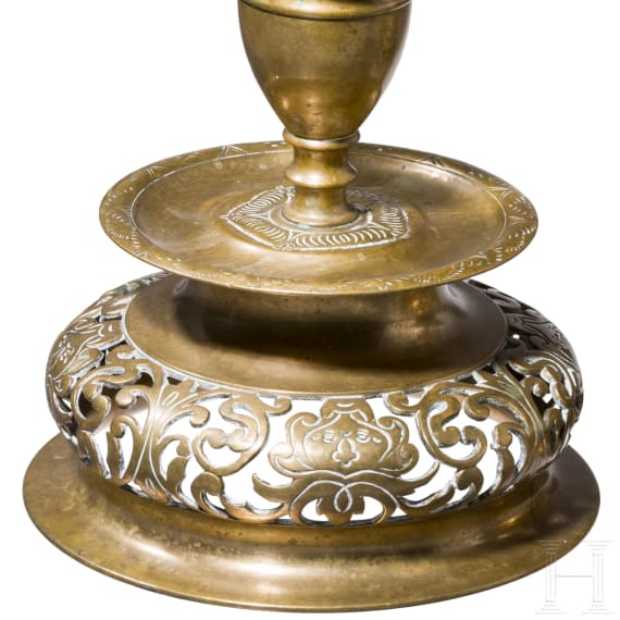 A pair of German pierced bell-bottom candlesticks in the Nuremberg style of the 17th century, circa 1880