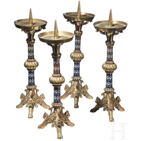 A set of four French gilt and enamelled pricket candlesticks in romanesque style, late 19th century