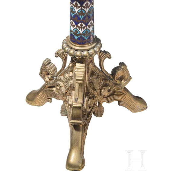 A set of four French gilt and enamelled pricket candlesticks in romanesque style, late 19th century
