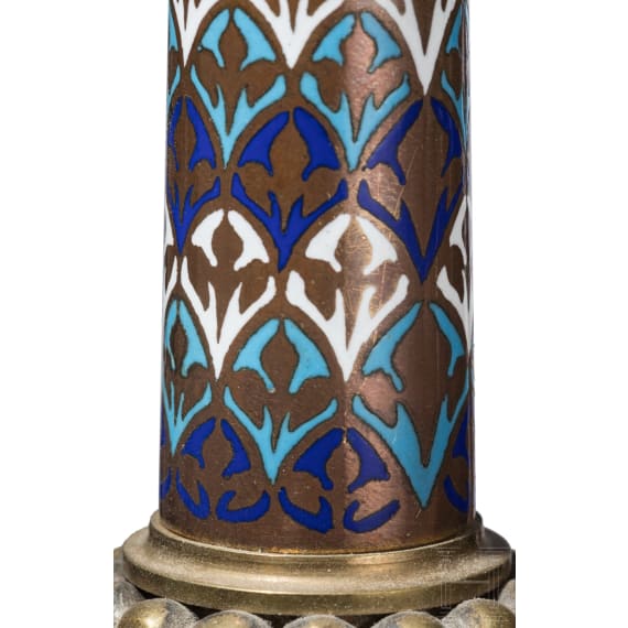 A set of four French gilt and enamelled pricket candlesticks in romanesque style, late 19th century