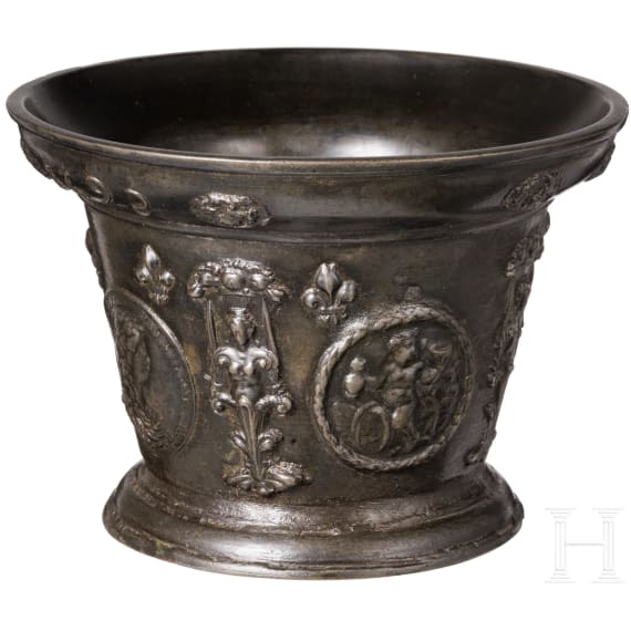 A distinguished, large French apothecary mortar with portrait of Louis XIV, dated 1692