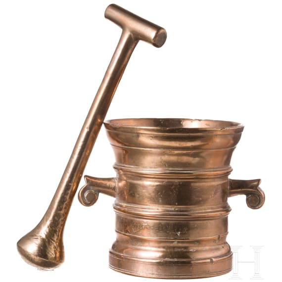 A German brass mortar with volute handles, 17th century
