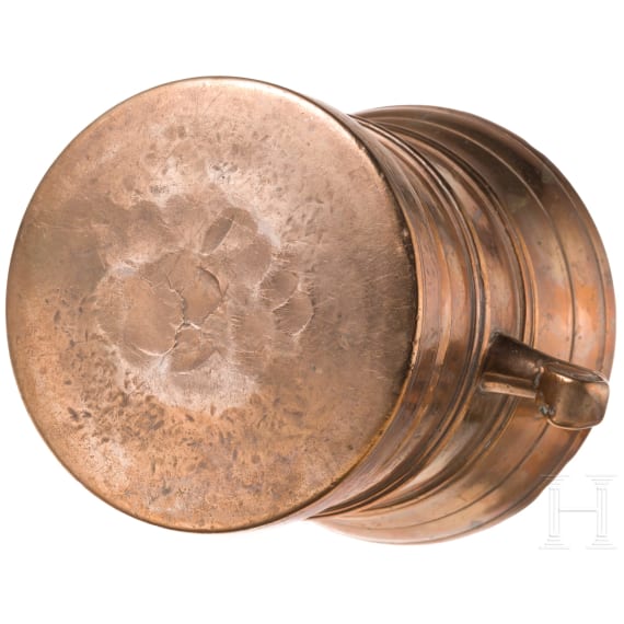 A German brass mortar with volute handles, 17th century