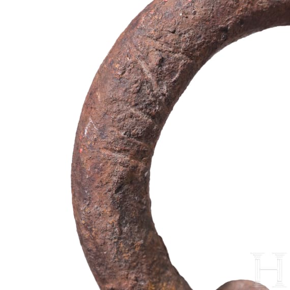 A South German wrought iron weight of eight pounds, 16th/17th century
