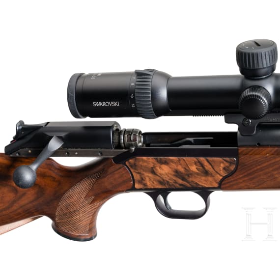 A Blaser R93 bolt action rifle, with Swarovski 3-12x50 scope and conversion barrel