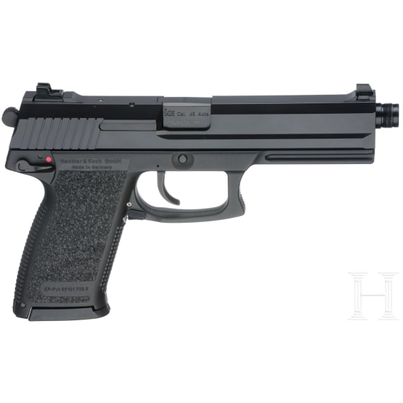A Heckler & Koch MK 23 with suppressor, in box