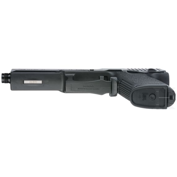 A Heckler & Koch MK 23 with suppressor, in box