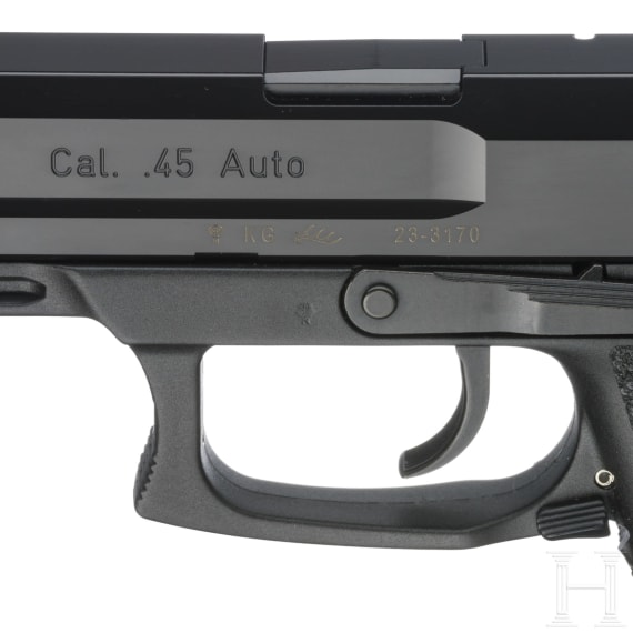 A Heckler & Koch MK 23 with suppressor, in box
