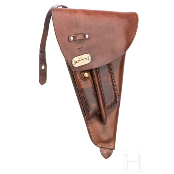 A holster for Lahti, with cleaning rod, screwdriver and cleaning box