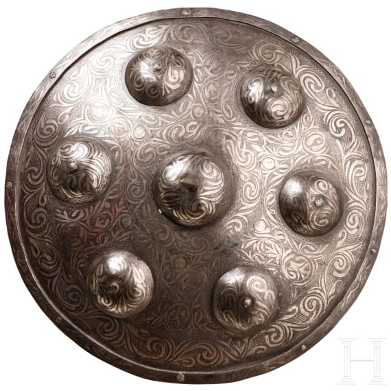 A round Indian silver-damascened iron shield, 20th century