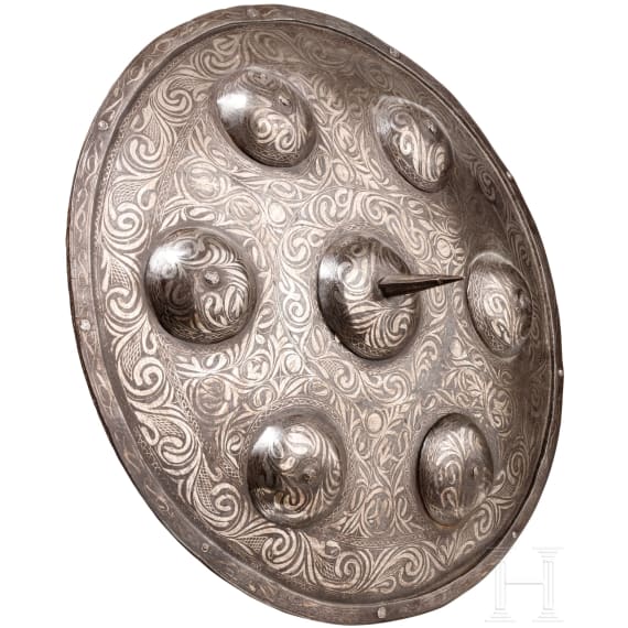 A round Indian silver-damascened iron shield, 20th century