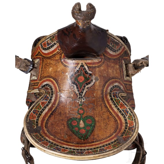 An Indopersian saddle with silver damascened stirrups, 19th century