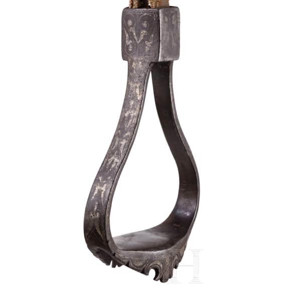 An Indopersian saddle with silver damascened stirrups, 19th century