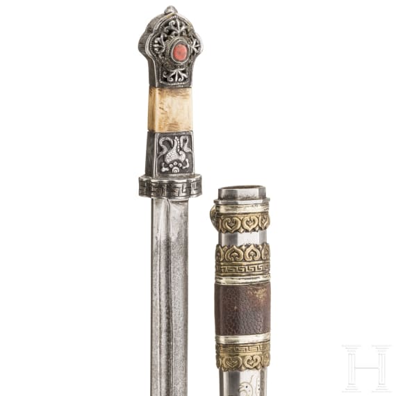 An iron-cut and brass-inlaid Tibetan lothi, 19th century