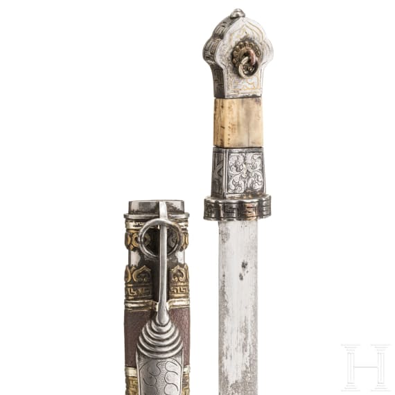An iron-cut and brass-inlaid Tibetan lothi, 19th century