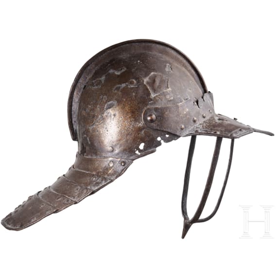 An English or Flemish lobster tail helmet with bar visor, circa 1640