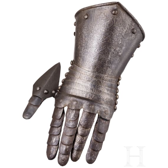 An Italian left armoured gauntlet with etched decoration, circa 1600