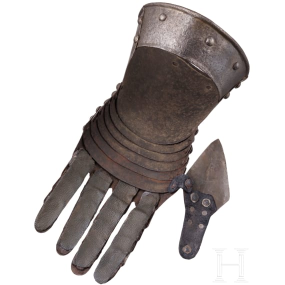 An Italian left armoured gauntlet with etched decoration, circa 1600