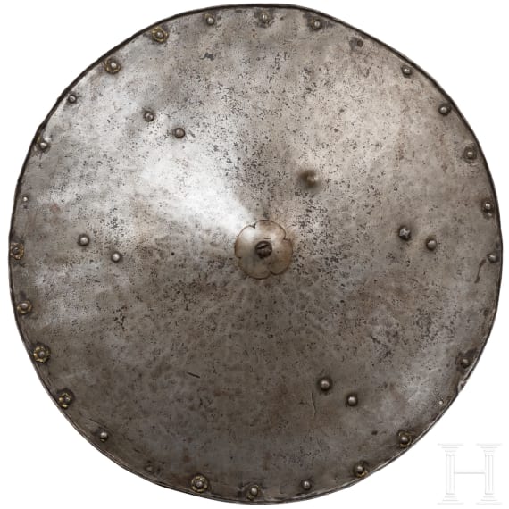 A bulletproof iron rondache, Nuremberg, circa 1590