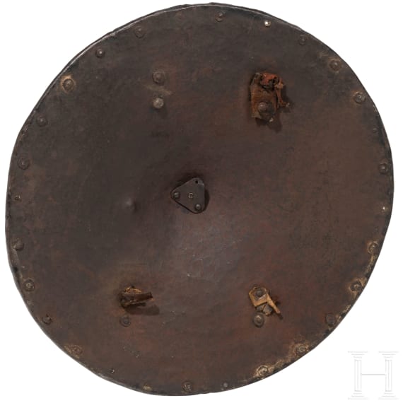 A bulletproof iron rondache, Nuremberg, circa 1590
