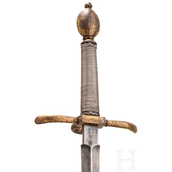 A small gilt German left-hand-dagger, circa 1600