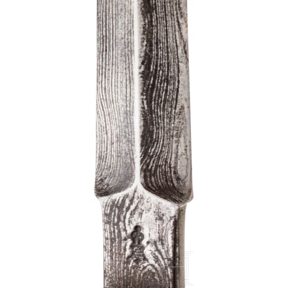 A small gilt German left-hand-dagger, circa 1600