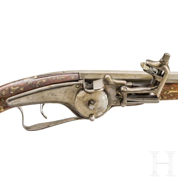 A long German wheellock pistol with lavish bone inlays, circa 1620