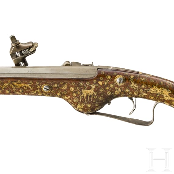 A long German wheellock pistol with lavish bone inlays, circa 1620