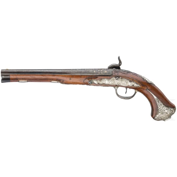 A German silver-mounted percussion pistol, circa 1780