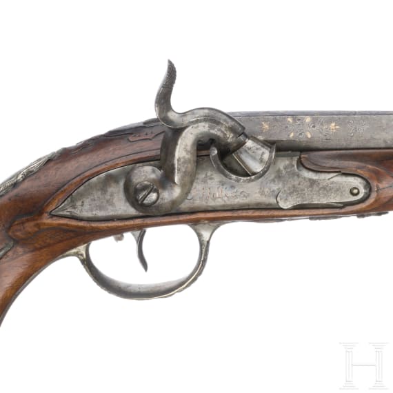 A German silver-mounted percussion pistol, circa 1780